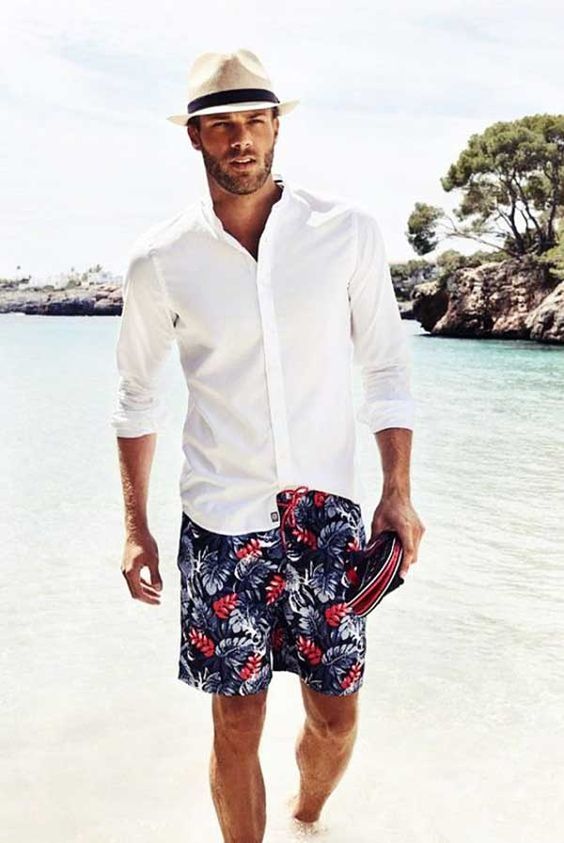 Picture Of a gorgeous beach look with a white shirt, navy .