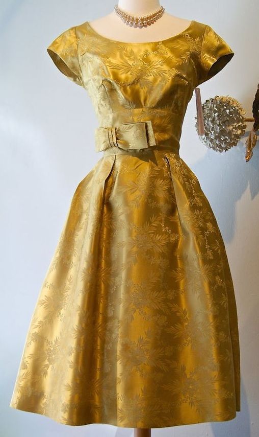 1960s brocade dress.... I think I have this dress... or it's .