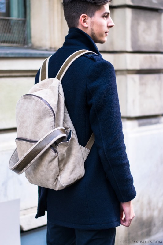 Picture Of a chic modern neutral backpack with brown straps is a .