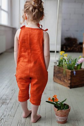 Washed linen girls jumpsuits for simple and casual look .