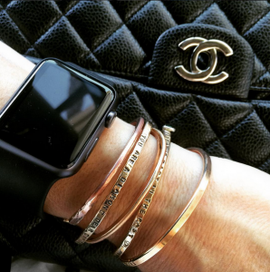 Love to stack our cuffs and bracelets with Chanel and my Apple .