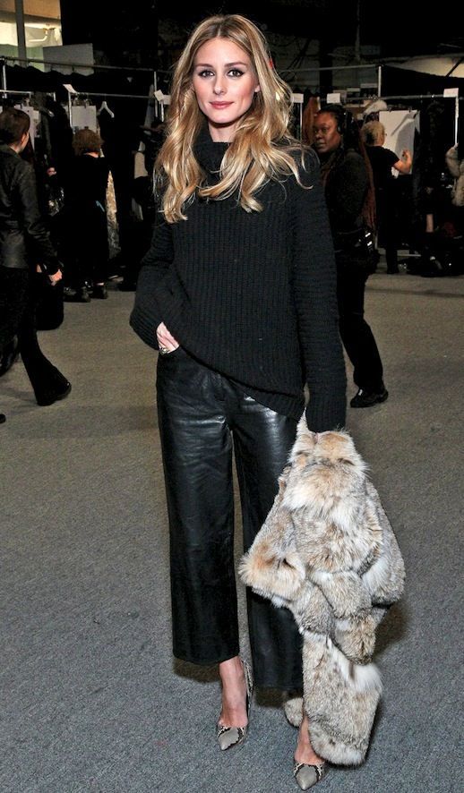 Olivia Palermo all black with wide leg leather pants and chunky .