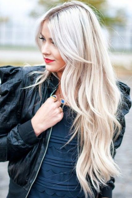 Picture Of a long layered haircut on blonde hair is a chic idea to .