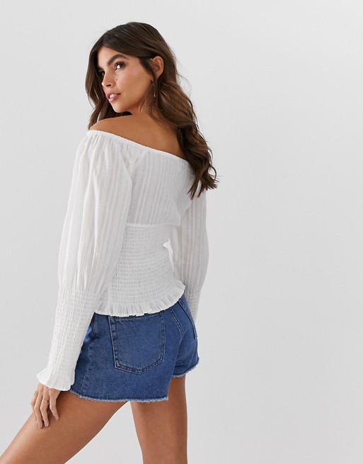 ASOS DESIGN long sleeve off the shoulder top with shirring detail .