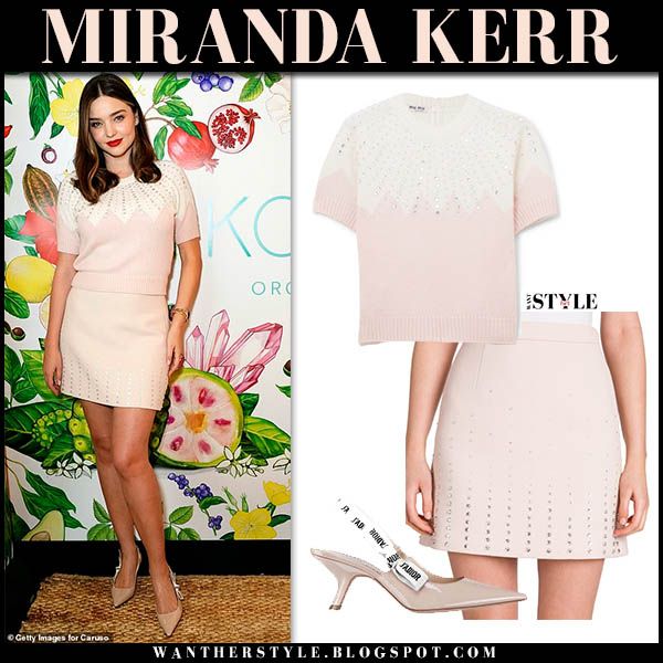Miranda Kerr in pale pink sweater and pink mini skirt in Los .