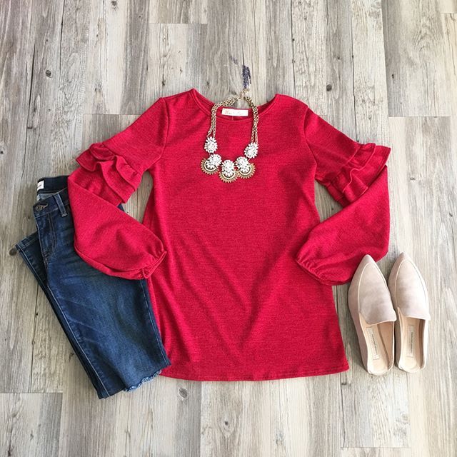 Ruffle Sleeve Sweater styled with denim, statement necklace and .