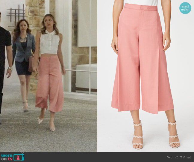Megan's white ruffled tie-back top and pink culottes on The .