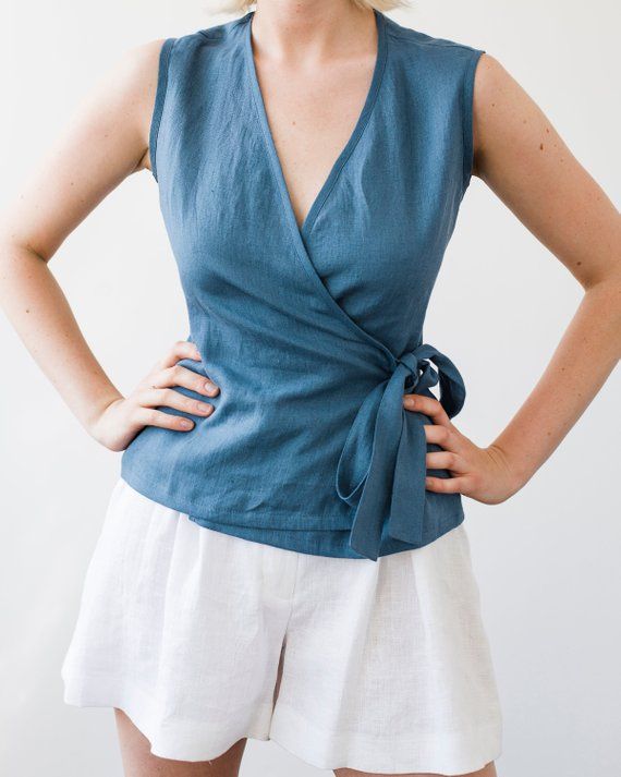 Fitted, aesthetic and very elegant sleeveless linen wrap top made .