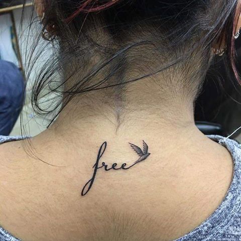 Bird with word free tattoo - Styleoholic | Back of neck tattoo .
