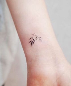 Pretty Tiny Flower Tattoo Design on Wrist for Women | Tattoo .