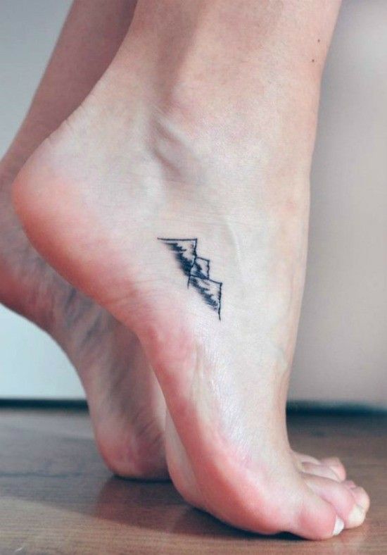 Dainty mountain tattoo | Tiny foot tattoos, Feminine tattoos, Tatto
