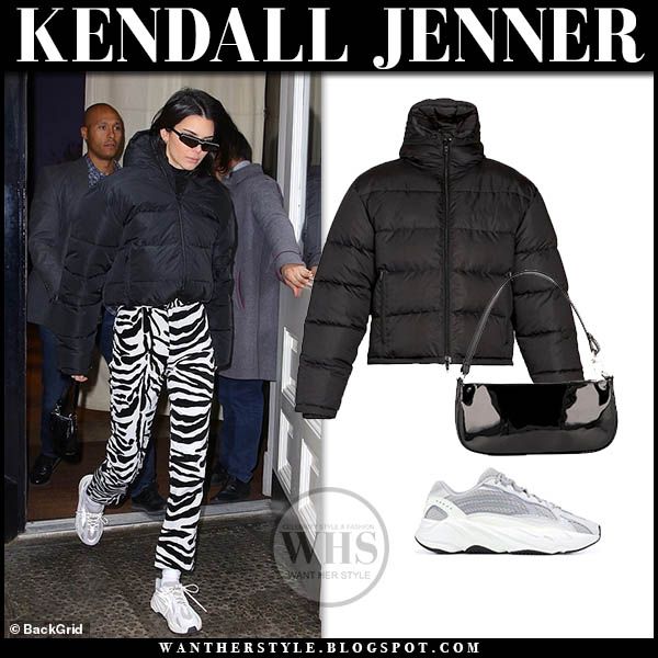 Kendall Jenner in black puffer jacket and zebra print pants at .