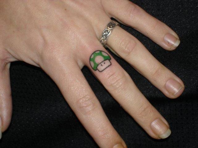 Small Finger Women Tattoos