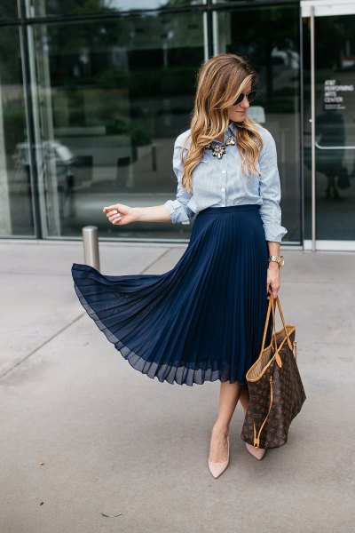 blue and white striped shirt with dark blue chiffon midi skirt