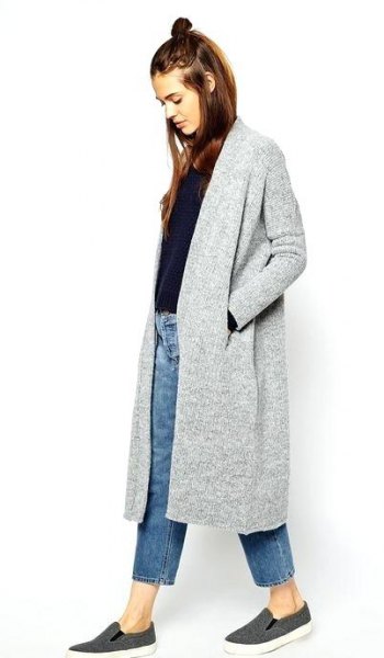 gray long cardigan with black sweater and blue ankle jeans