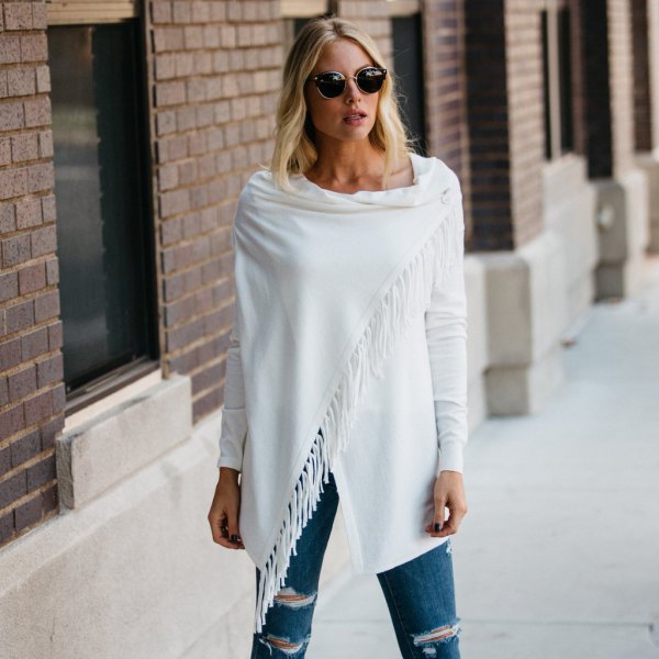 ripped jeans with white fringes