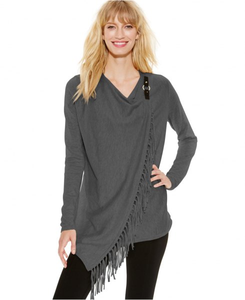 black skinny jeans with a gray fringed wrap