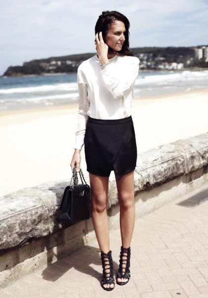 white button down shirt, skort and black lace-up sandals