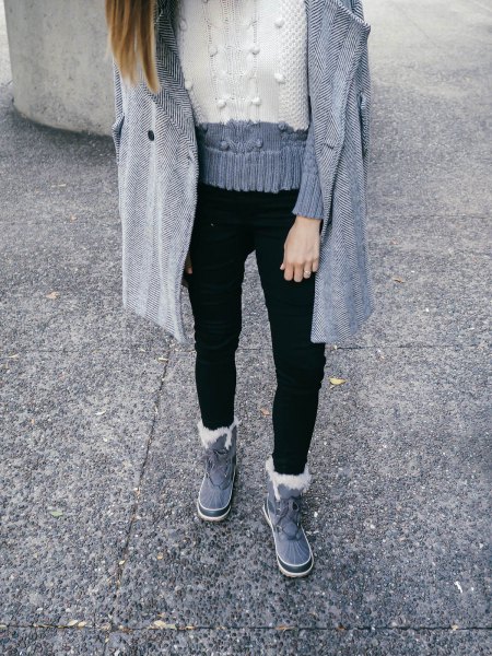 gray and white block-knit sweater with black jeans