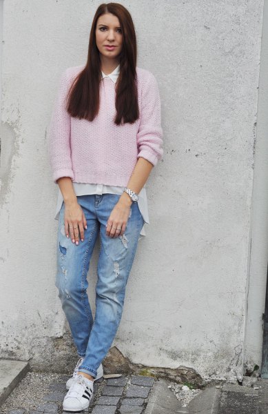 pink sweater with white oversized shirt and blue boyfriend jeans