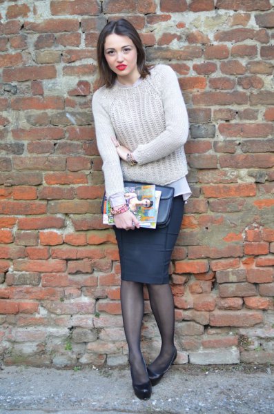 Chunky knit sweater with black pencil skirt and stockings