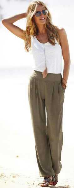 white vest top with green beach pants with wide legs