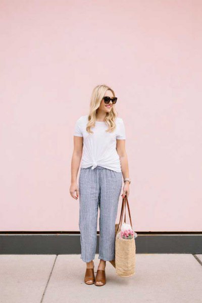white knotted t-shirt with dark blue striped beach pants