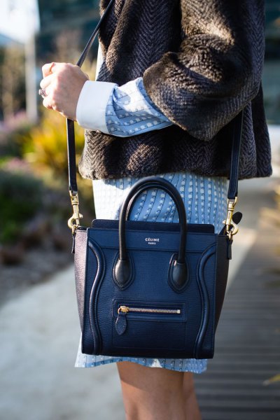 dark blue leather handbag with tweed jacket and blue dress