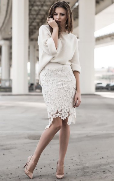 white, thick sweater with knee-length lace skirt