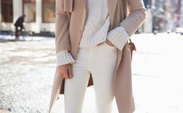 chunky ivory sweater with red coat and cream jeans
