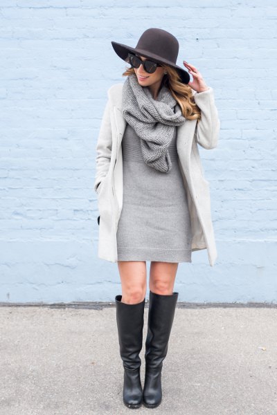 white cocoon coat with gray sweater mini dress and knitted scarf