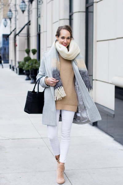 Light gray cocoon coat worn with a blush pink sweater and white cropped jeans