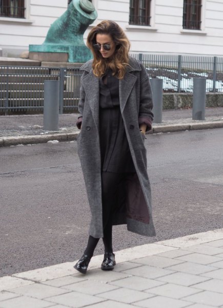 gray wool maxi coat with buttoned shirt and pleated mini skirt