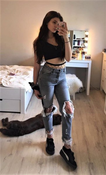 black short vest top with ripped boyfriend jeans and platform sneakers