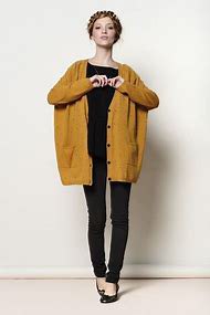 dark mustard yellow chunky knit sweater with black t-shirt
