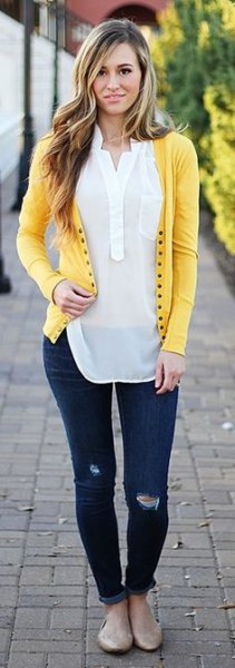 light yellow cardigan with white semi-transparent polo shirt