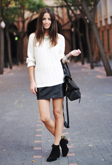 white knit sweater black leather mini skirt in winter