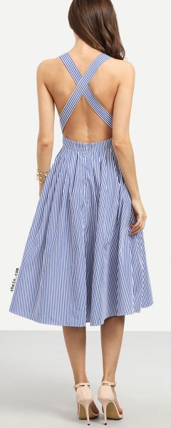 Dark blue and white striped midi dress with a cross back