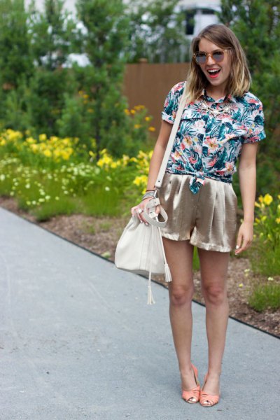 blue and white floral shirt and rose gold mini silk shorts