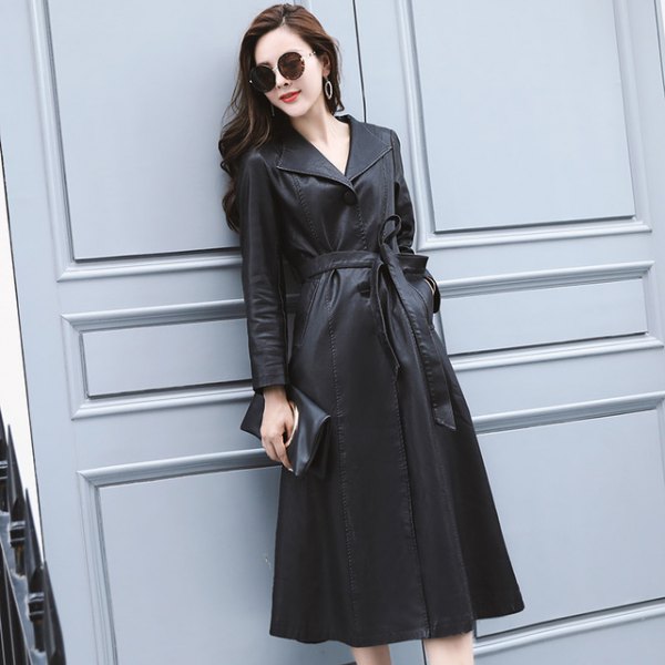 black trench coat dress with belt and ankle boots
