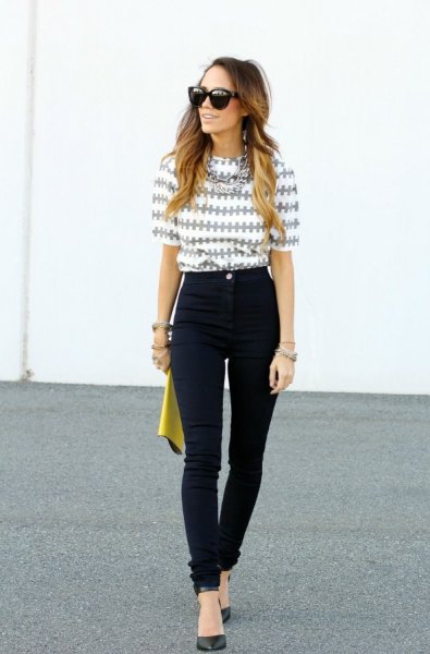 gray and white printed blouse with half sleeves and black high-waisted jeans