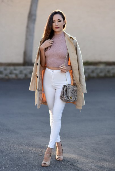 gray figure-hugging cropped sweater with white skinny jeans