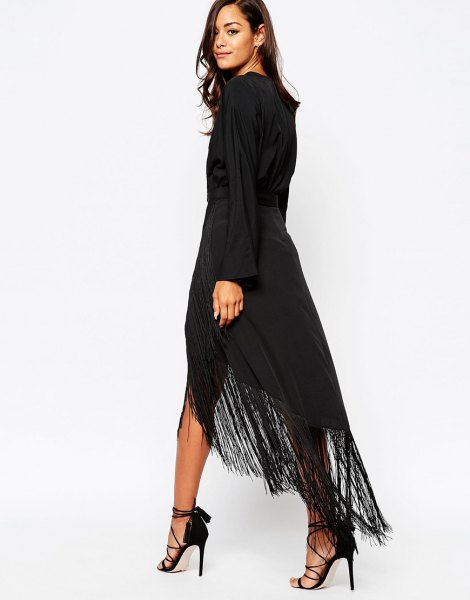 black long-sleeved maxi dress with high fringes