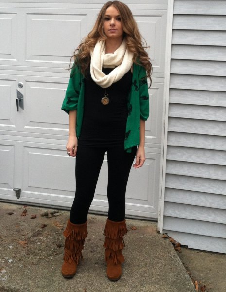 green cardigan with fringed mid-calf boots