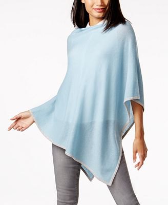 teal semi-transparent cashmere poncho over white button down shirt