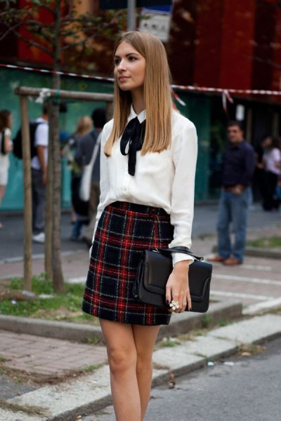 white bow tie blouse with red and black plaid mini skirt