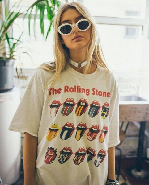 white oversized Rolling Stone t-shirt with high waisted blue jeans