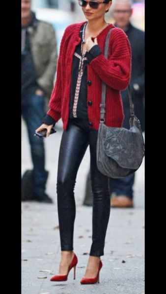 red cardigan with black leather pants