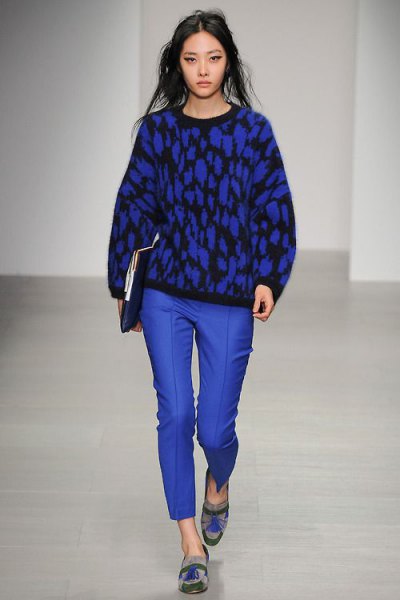 black printed knit sweater with royal blue wax pants and graphic dress shoes