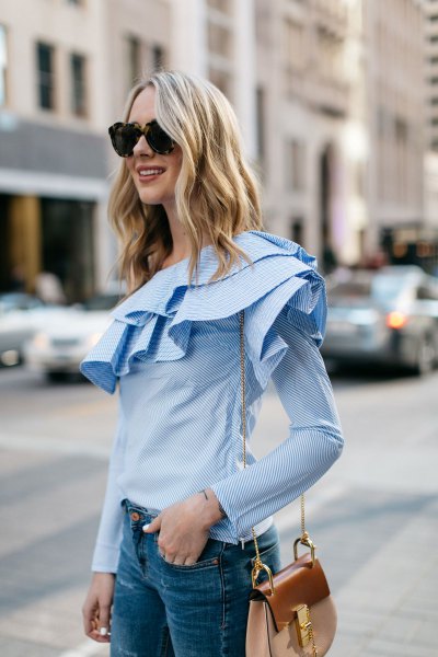light blue long-sleeved ruffled blouse